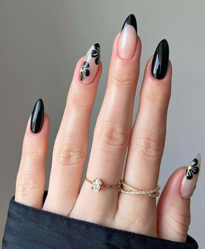 black and nude floral nail design